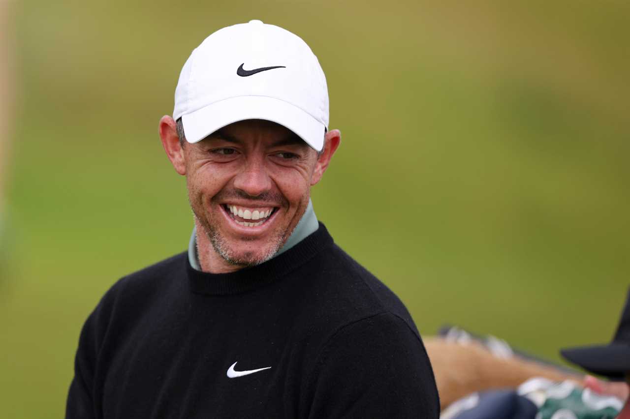 Rory McIlroy smiling during a practice round.