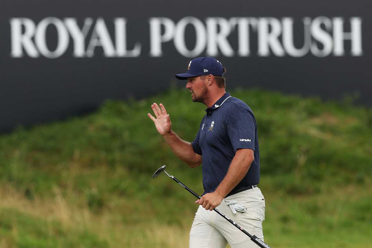 Bryson DeChambeau reacts on the 18th green.