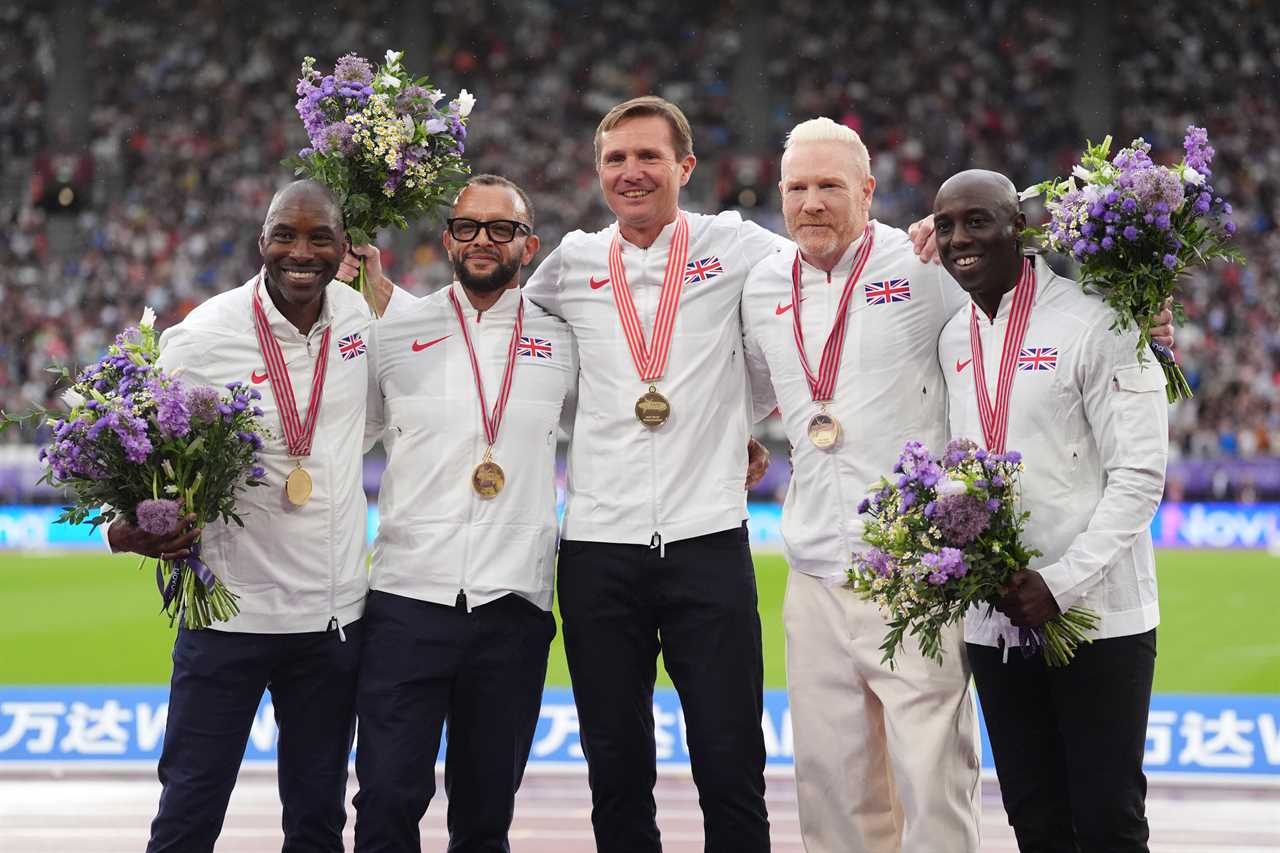 Great Britain's 1997 World Athletics Championships 4x400m relay team receiving gold medals.