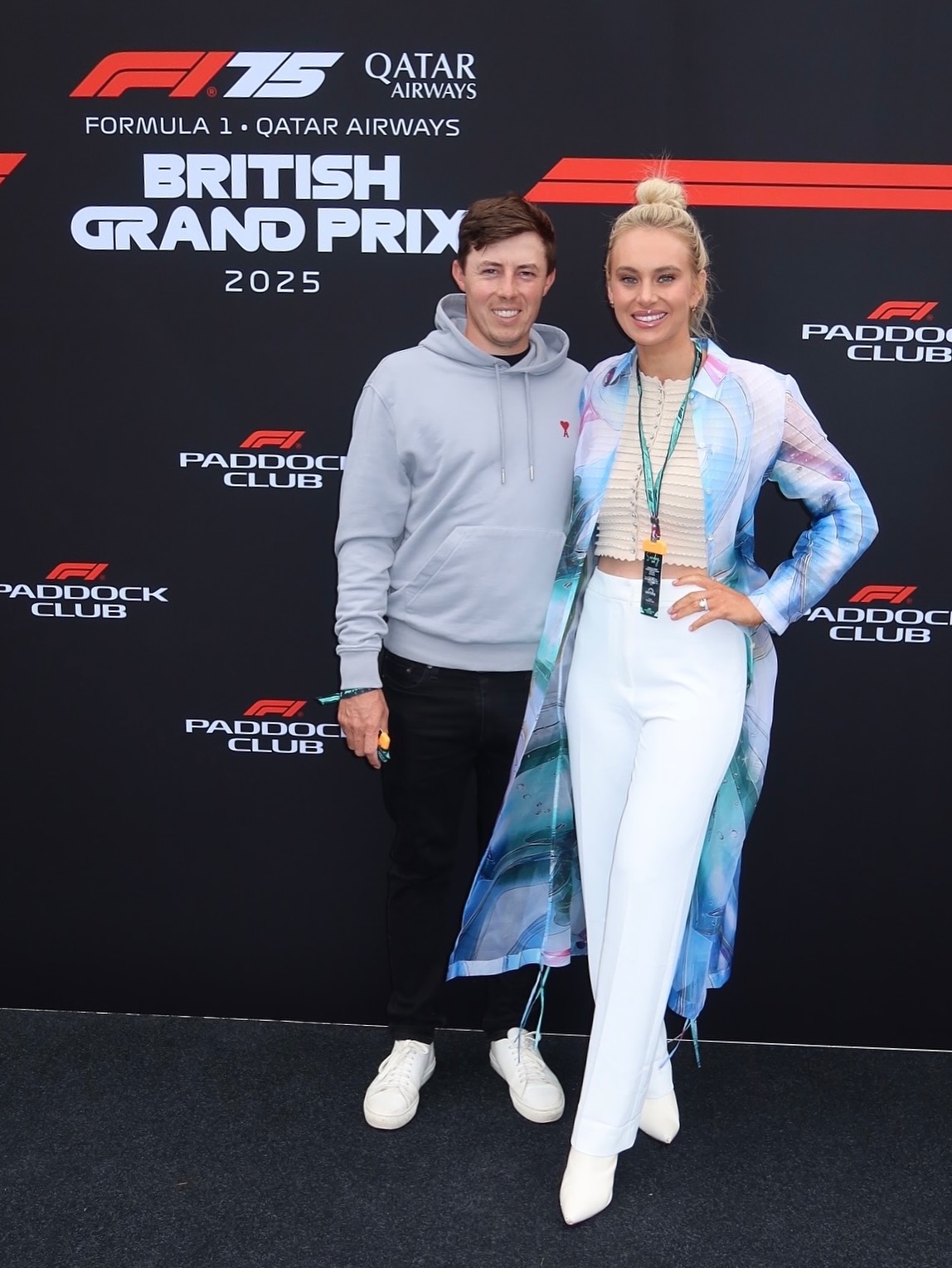 Matt Fitzpatrick and Katherine Gaal at the 2025 British Grand Prix.