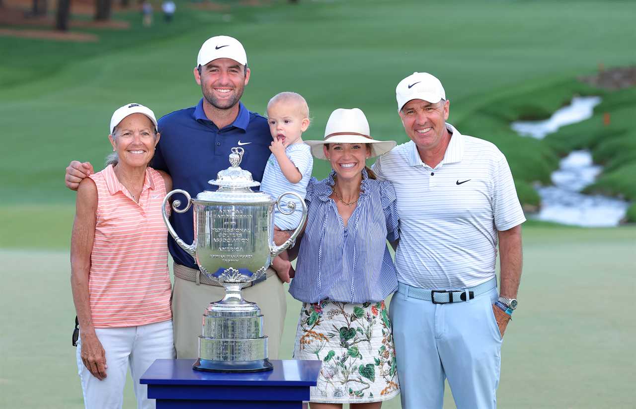 Scottie Scheffler with his family and the Wanamaker Trophy.