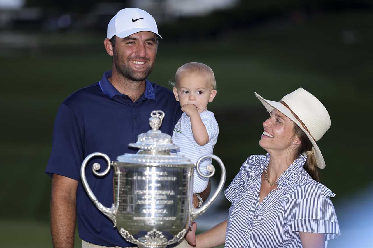 Scottie Scheffler with his family and the Wanamaker Trophy.
