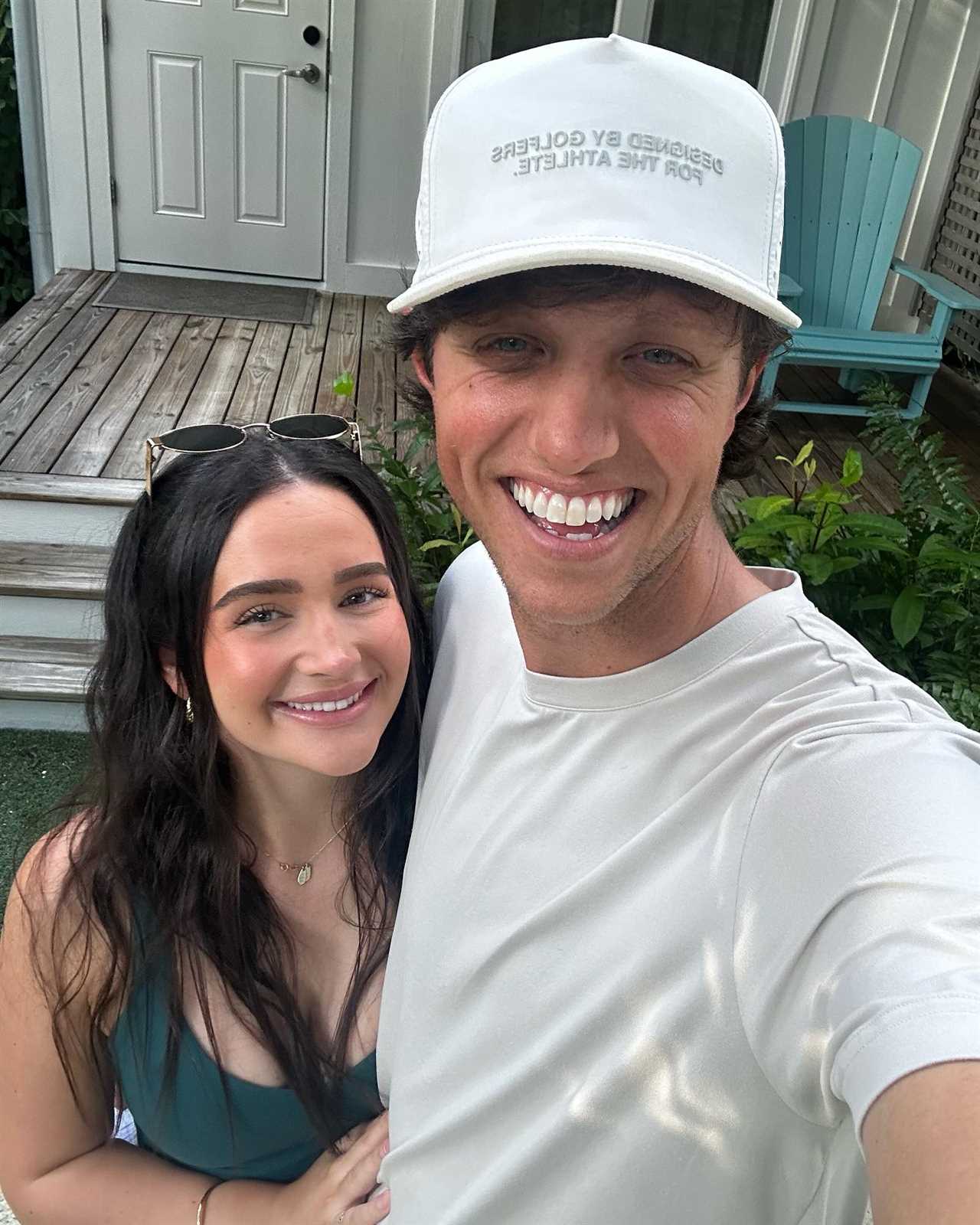 Smiling couple posing for a selfie.