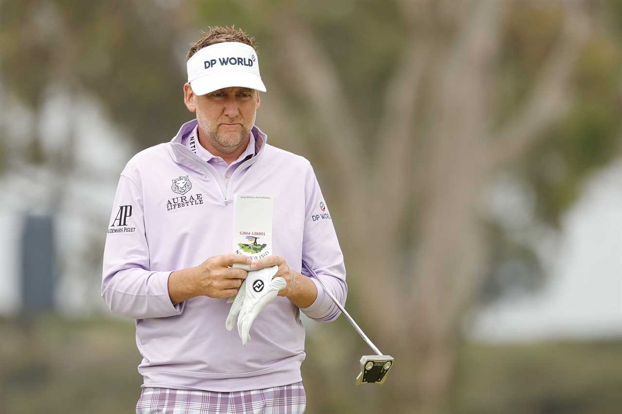 Ian Poulter preparing to putt during a golf tournament.