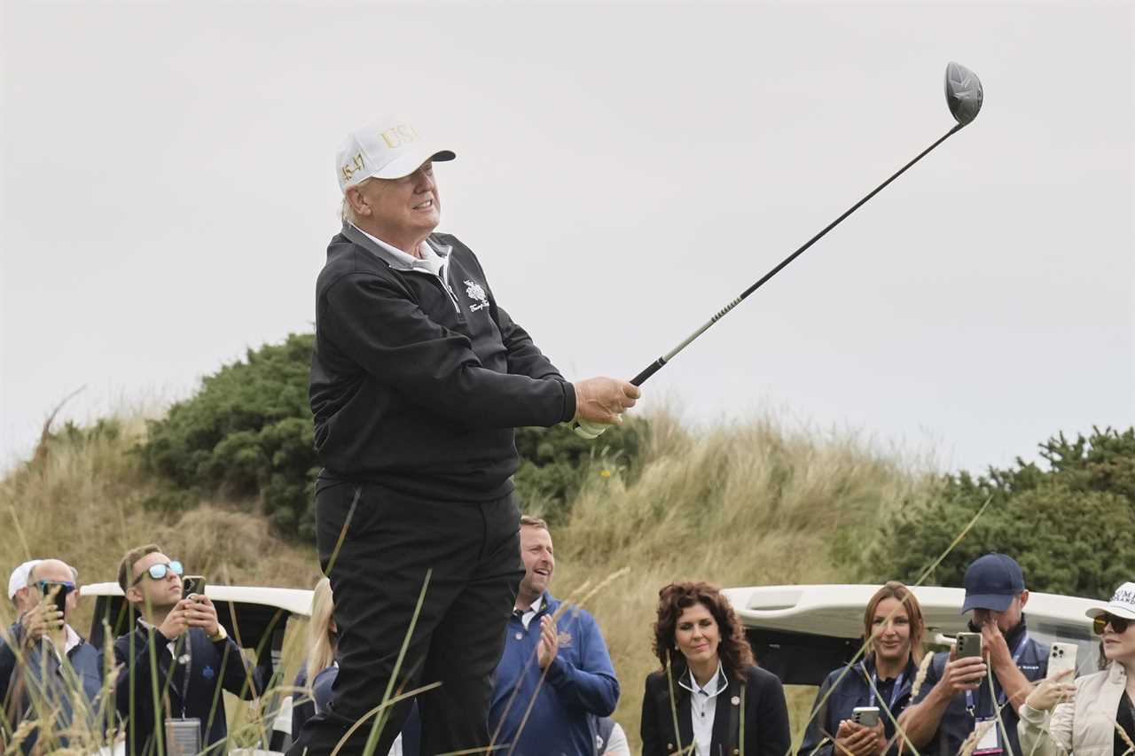 Donald Trump golfing.