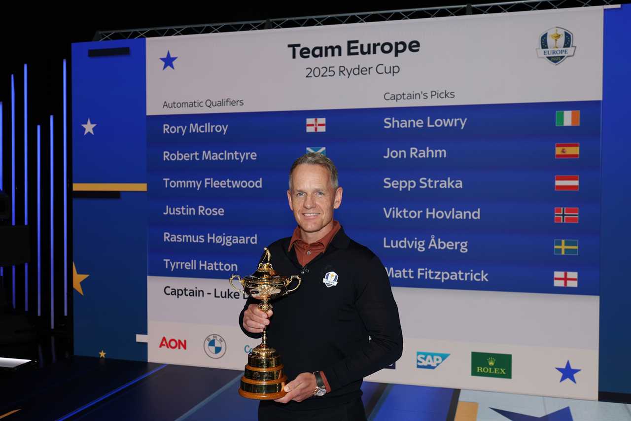 Luke Donald, 2025 Ryder Cup Team Europe captain, holding the Ryder Cup trophy. The team roster is visible behind him.