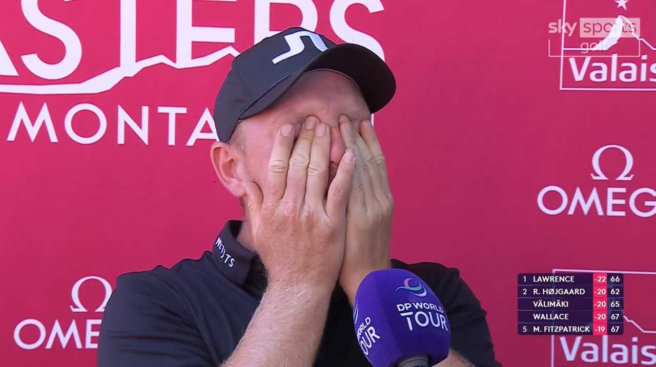 Golfer covering his face with his hands during an interview.